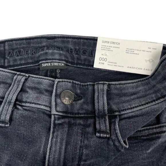 NWT AMERICAN EAGLE Super Hi-Rise Jegging Destroyed Hem Sz 000 Blue Black - Picture 3 of 7